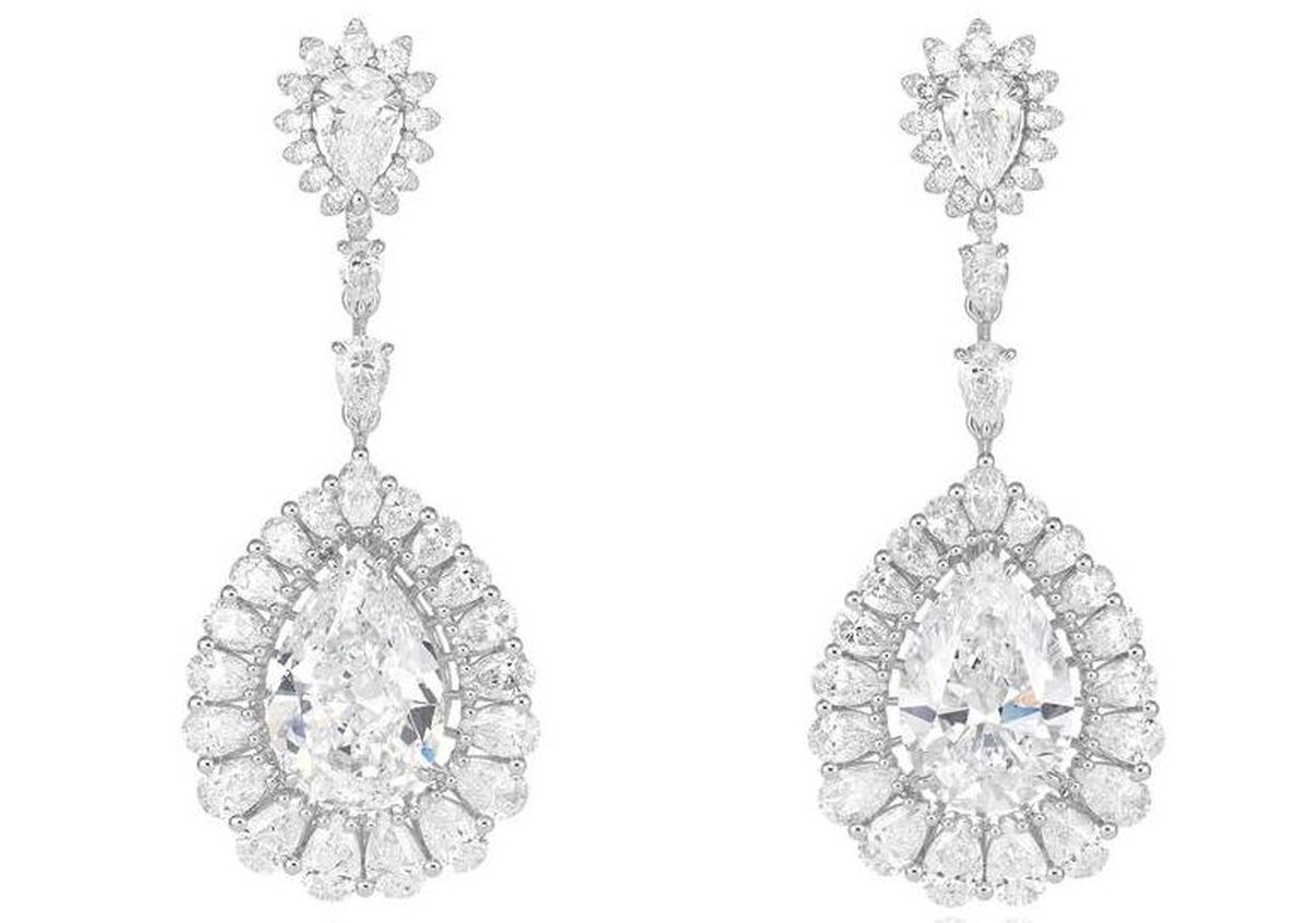 earrings featuring 11.17 carats of pear-brilliant cut diamonds and 6.27 carats of pear shaped diamonds set in 18-carat white gold Sharon Stone selected earrings featuring 11.17 carats of pear-brilliant cut diamonds and 6.27 carats of pear shaped diamonds set in 18-carat white gold