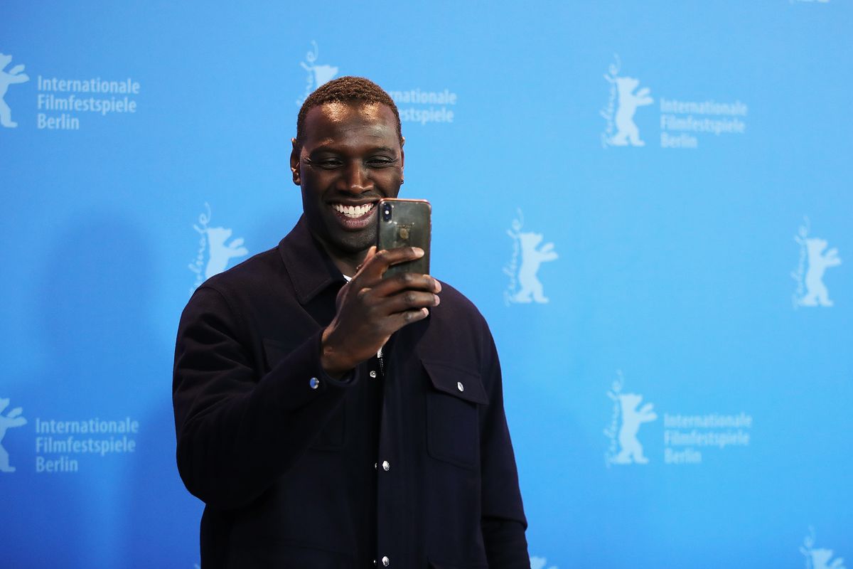 Омар Си на фотоколле фильма «Ночной конвой» во время 70-го Берлинского международного кинофестиваля, 28 февраля 2020 г. Омар Си на фотоколле фильма «Ночной конвой» во время 70-го Берлинского международного кинофестиваля