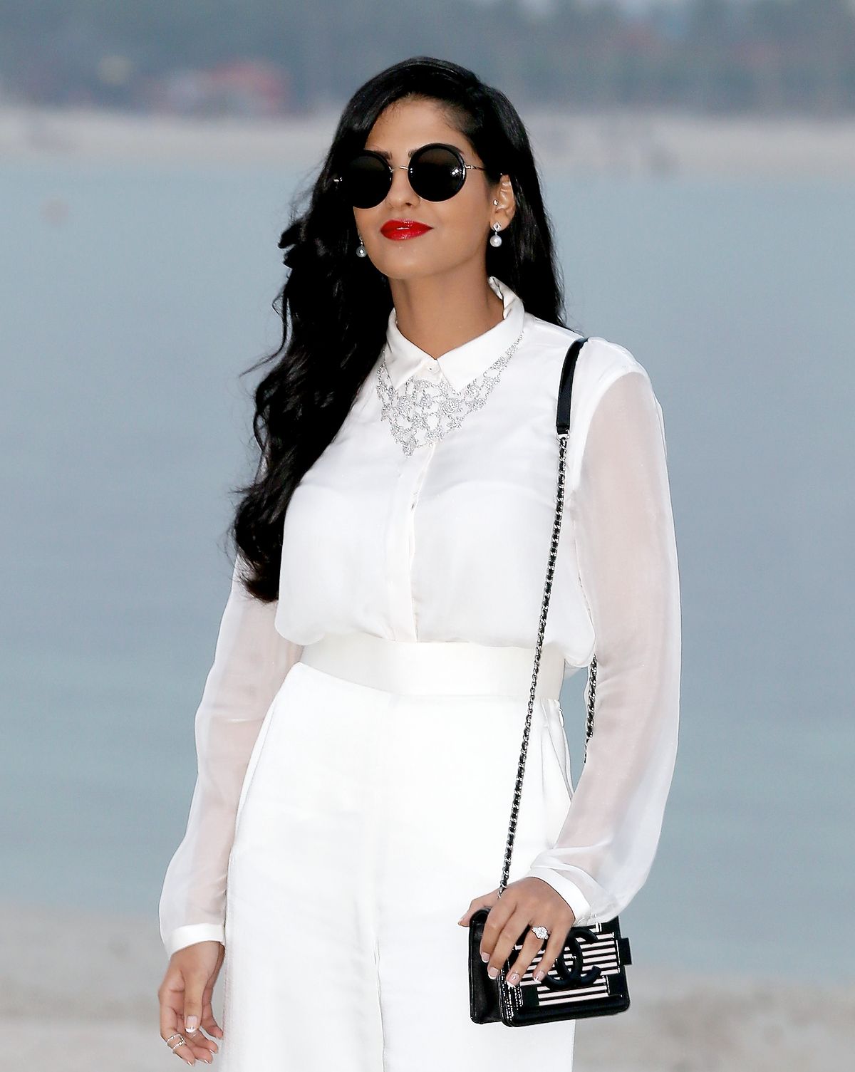 Принцесса Амира Аль-Тавил на фотоколле шоу Chanel Cruise Collection 2014/2015