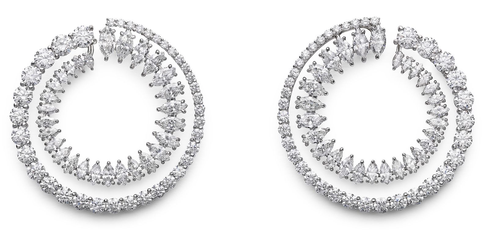 Серьги Chopard с бриллиантами 18,69 карата в оправе из коллекции Haute Joaillerie Серьги Chopard с бриллиантами 18,69 карата в оправе из 18-каратного белого золота и титана из коллекции Haute Joaillerie