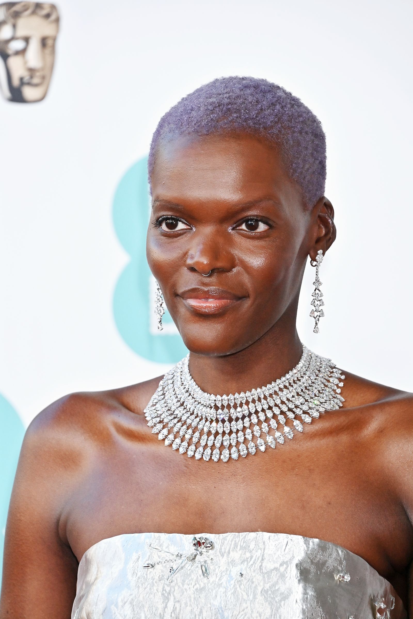 Шила Атим на красной дорожке 76-й церемонии вручения кинопремии BAFTA 2023 в Лондоне, 19 февраля 2023 г.